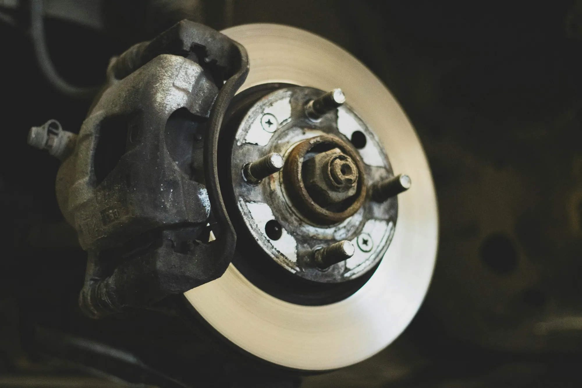 Brake disc and caliper on a car hub, close up